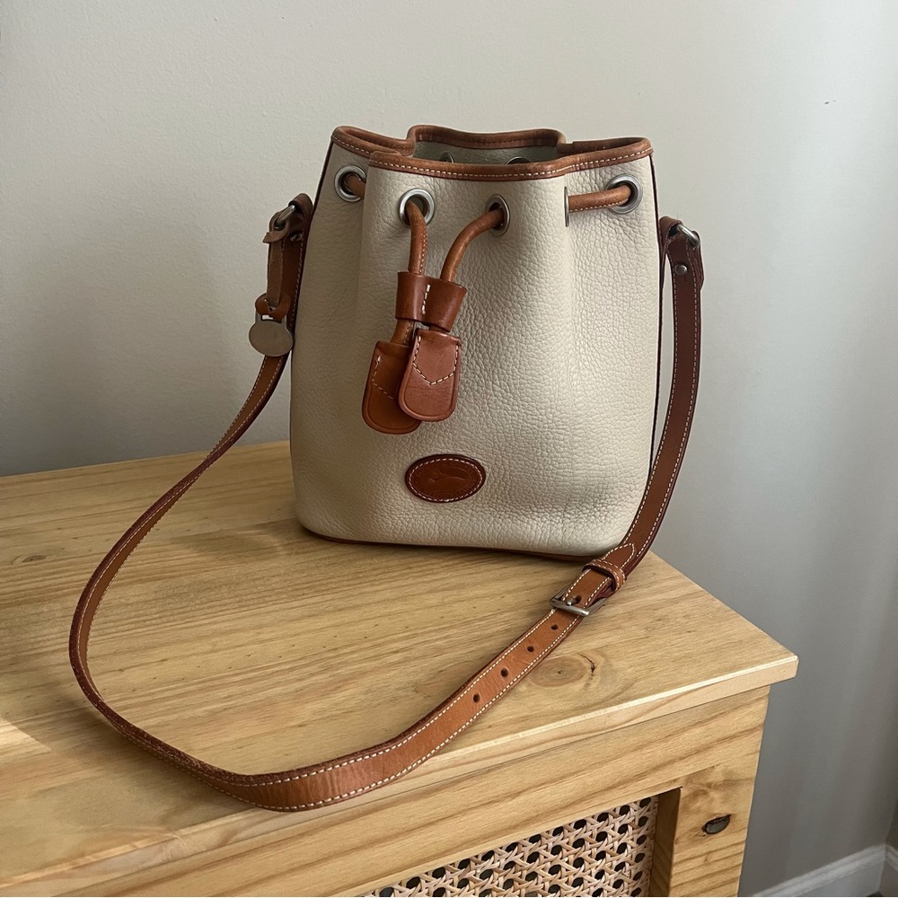 Dooney & Bourke Beige and Brown Leather Drawstring Bucket Bag